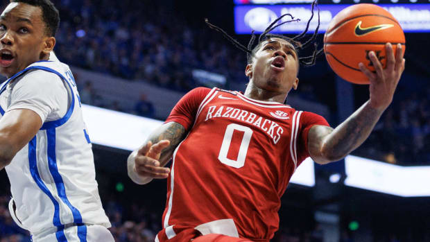 Razorbacks Khalif Battle has a layup against Kentucky